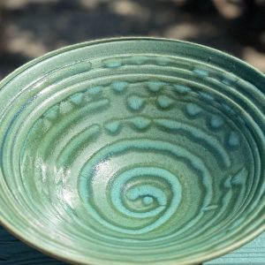 Nichibei Potters bowl Jade green color achieved by applying a copper glaze to porcelain clay and high-firing it in a gas kiln at 2,400 degrees.