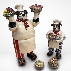 Cynthia Hipkiss' hand built sculptures of two dogs dressed as chefs